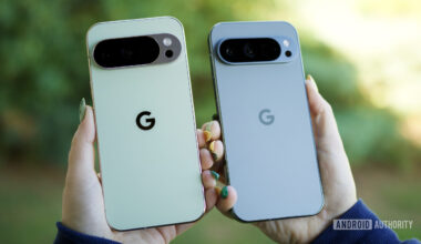 Someone holding the Pixel 10 Pro and Pixel 9 Pro, showing the backs of the phones.