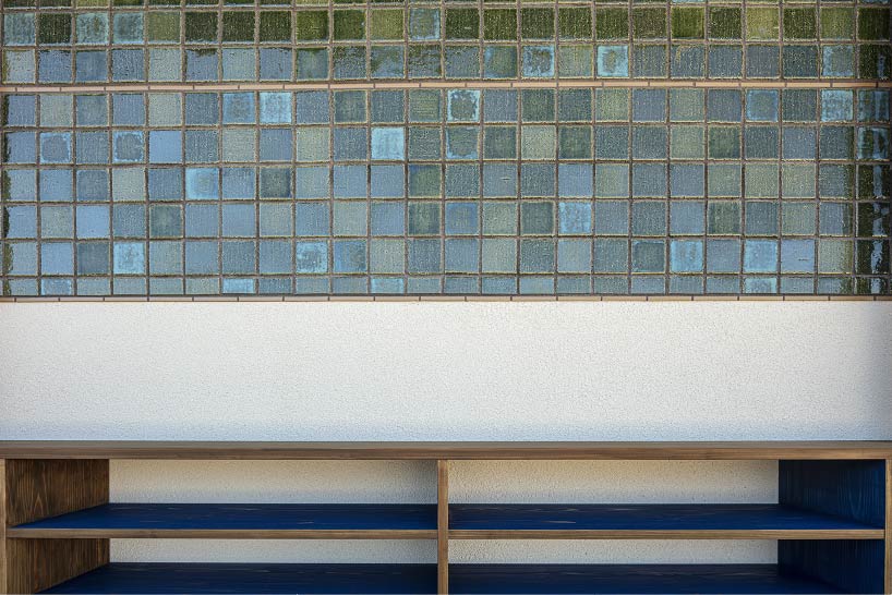 curved wooden frame shapes light-filled daycare center in japan encouraging playful learning