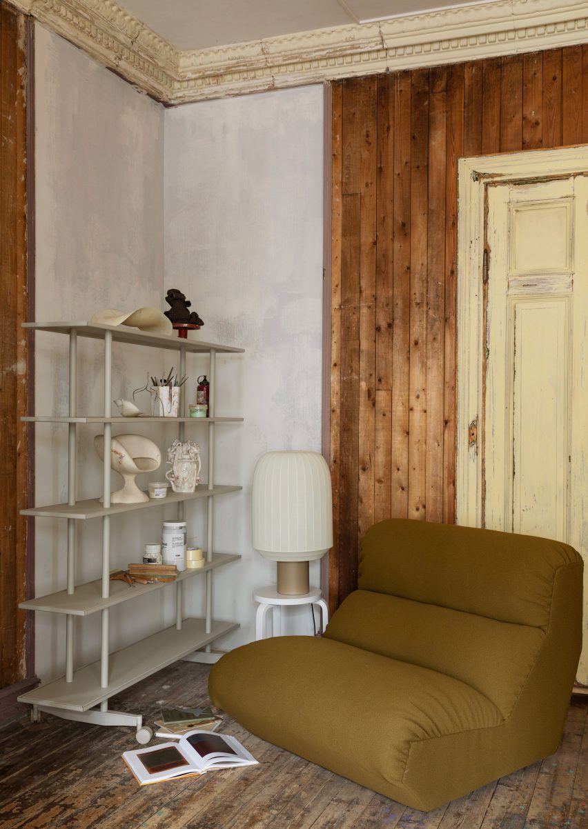 Lounge chair next to a shelving unit