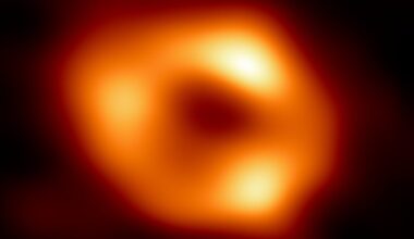 This is the first image of Sgr A*, the supermassive black hole at the centre of our Galaxy. Astronomers now think its possible for galactic black holes to evolve as binary pairs (Credit : EHT Collaboration)