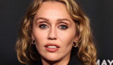 Miley Cyrus Wears a Plunging Power Suit for a Maybelline Launch