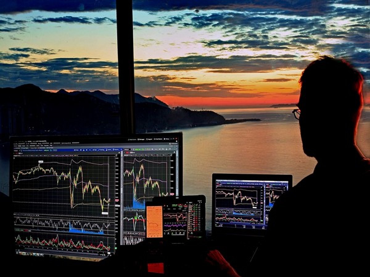 Global risk-off mood hits Asia, yet Sensex and Nifty stay afloat by midday