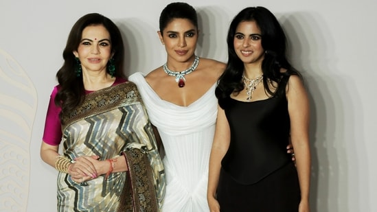 Nita Ambani and Isha Ambani pose with Priyanka Chopra at the Bvlgari exhibition. (PTI)