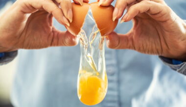 Person breaking an egg