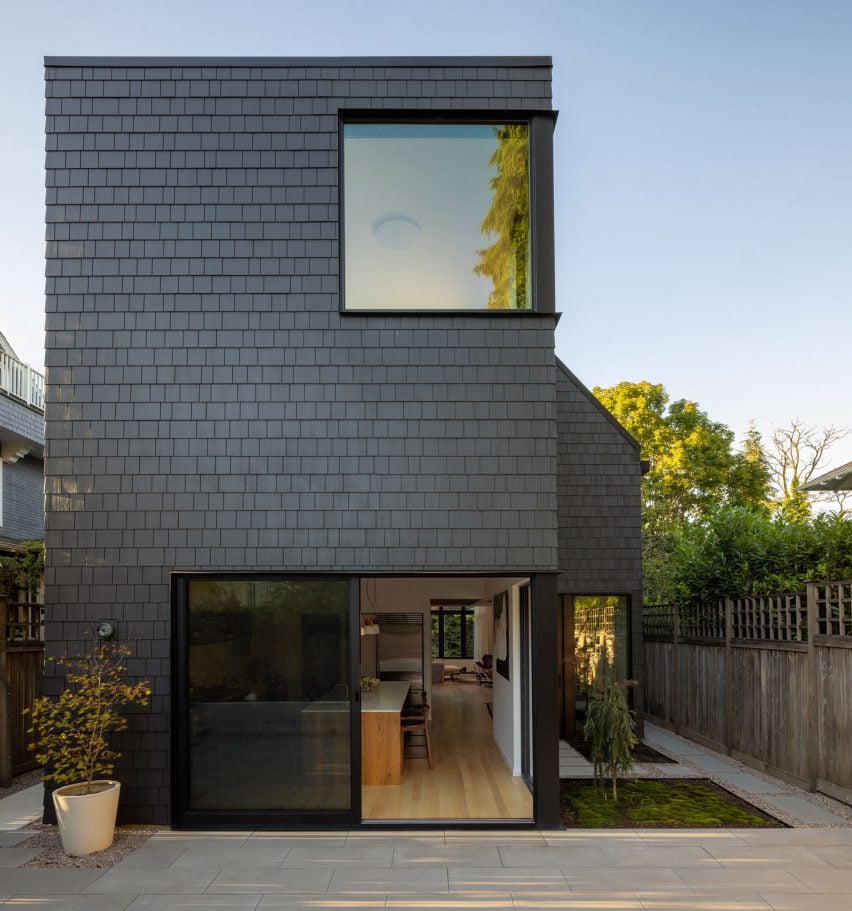 Black house with monitor window