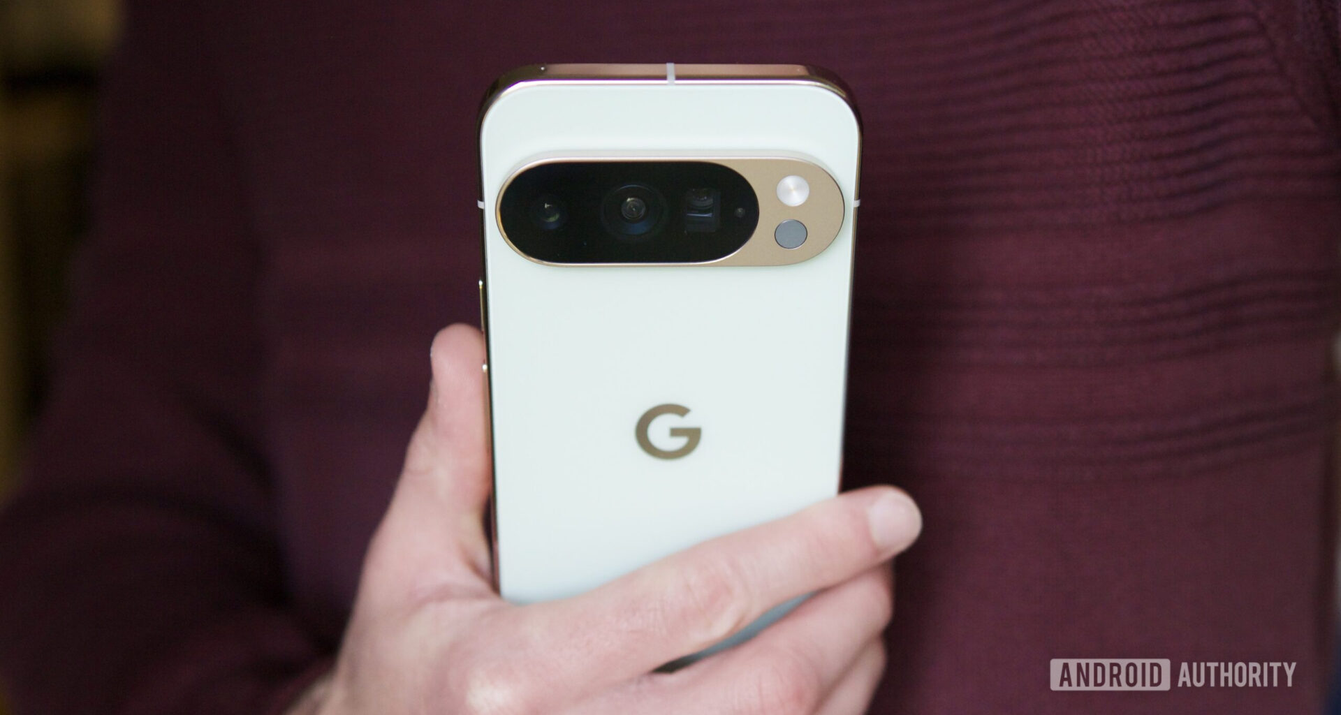 Someone holding the Pixel 10 Pro, showing the back of the phone.