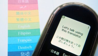A translation device with the phrase "Let's talk using this translator" translated into Japanese