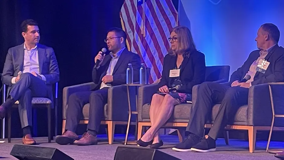 Hebin Li speaks at a Quantum Beach panel discussion