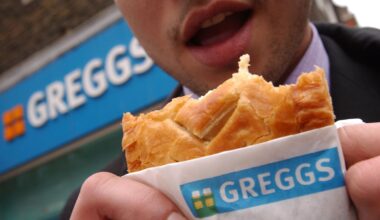 Someone eating a Greggs pasty. Pic: AP