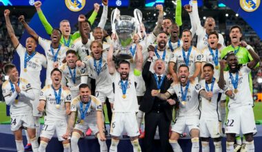 Real Madrid's players celebrate with the trophy after winning the Champions League final soccer match between Borussia Dortmund and Real Madrid at Wembley stadium in London, Saturday, June 1, 2024. (AP Photo/Kirsty Wigglesworth)