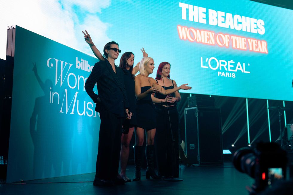 The Beaches accept the Women of the Year award at Billboard Canada Women in Music on Oct. 1, 2025 at Rebel in Toronto.