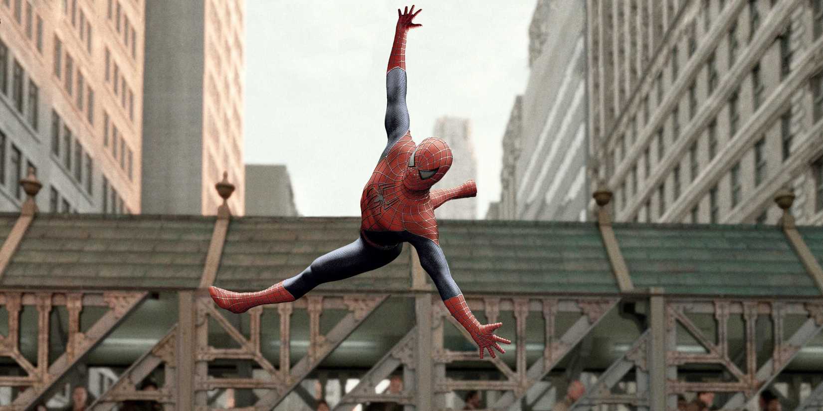 Tobey Maguire As Spider-Man In Full Costume Spinning Midair In NYC In Spider-Man 2