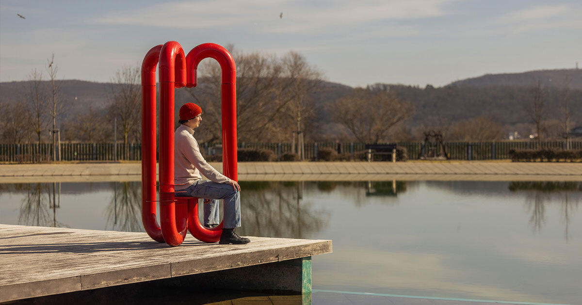 tripus installation turns industrial pipes into intimate public shelter