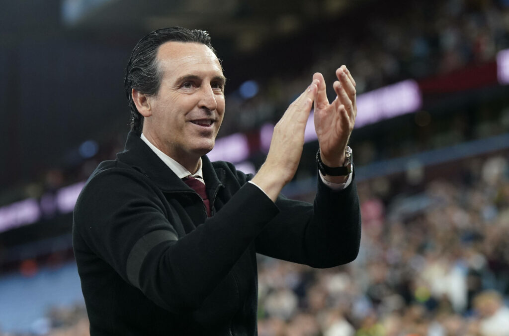 Aston Villa manager Unai Emery looking happy while clapping