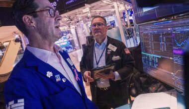 Most US stocks rise after swinging through another erratic day