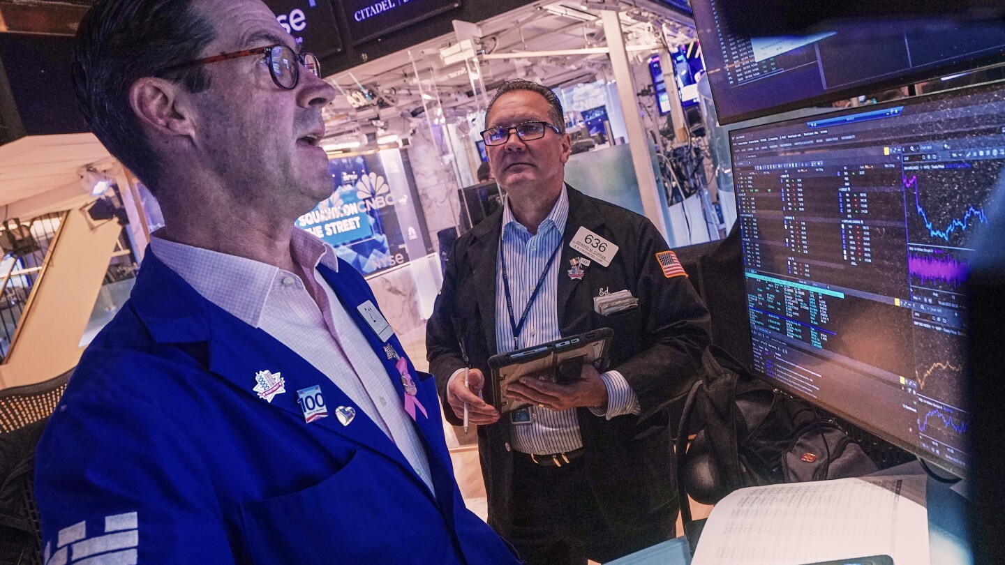 Most US stocks rise after swinging through another erratic day