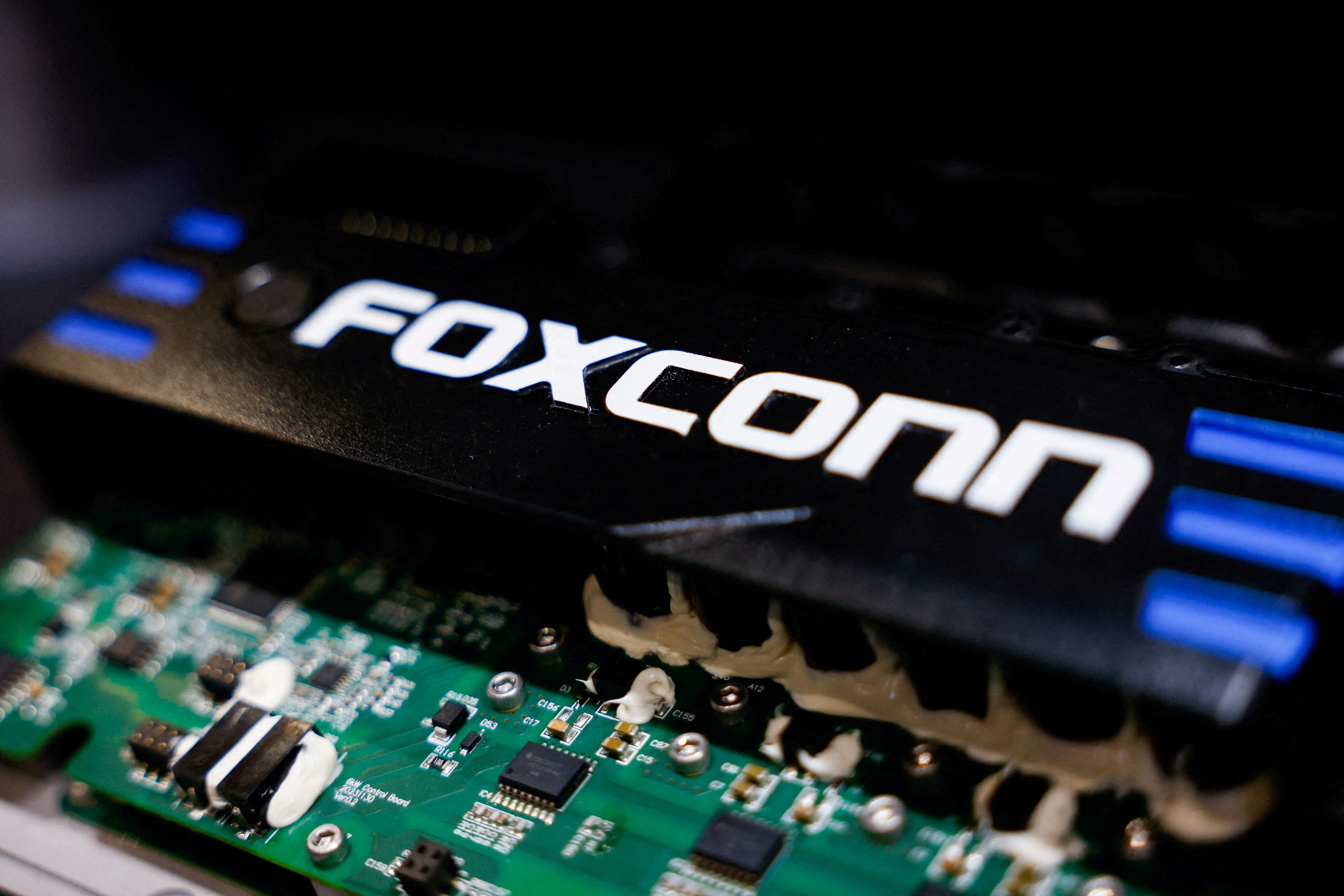 Foxconn electric two-wheeler powertrain system with the Foxconn logo.