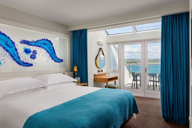 A photo of a bedroom suite at The Cliff House Hotel