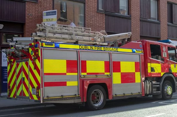 A Dublin City Fire Brigade truck parked on a Dublin Street in Ireland.