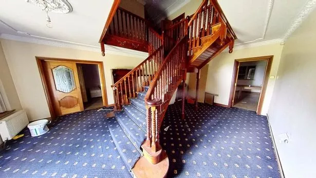 The house's ornate stair case.