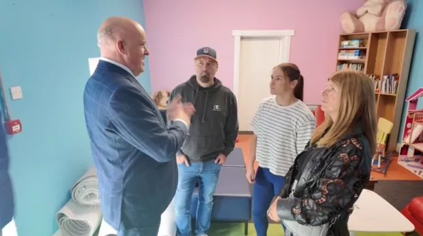 Katie Taylor with her husband Sean (wearing cap), mother Bridget and Senator Aubrey McCarthy
