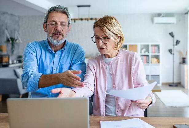 A couple check their finances