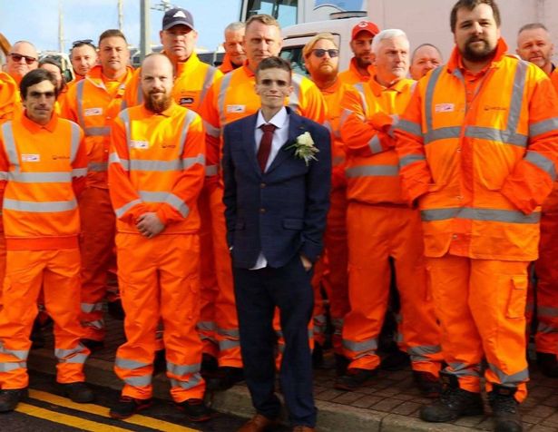 Stephen with the bin men on his special day