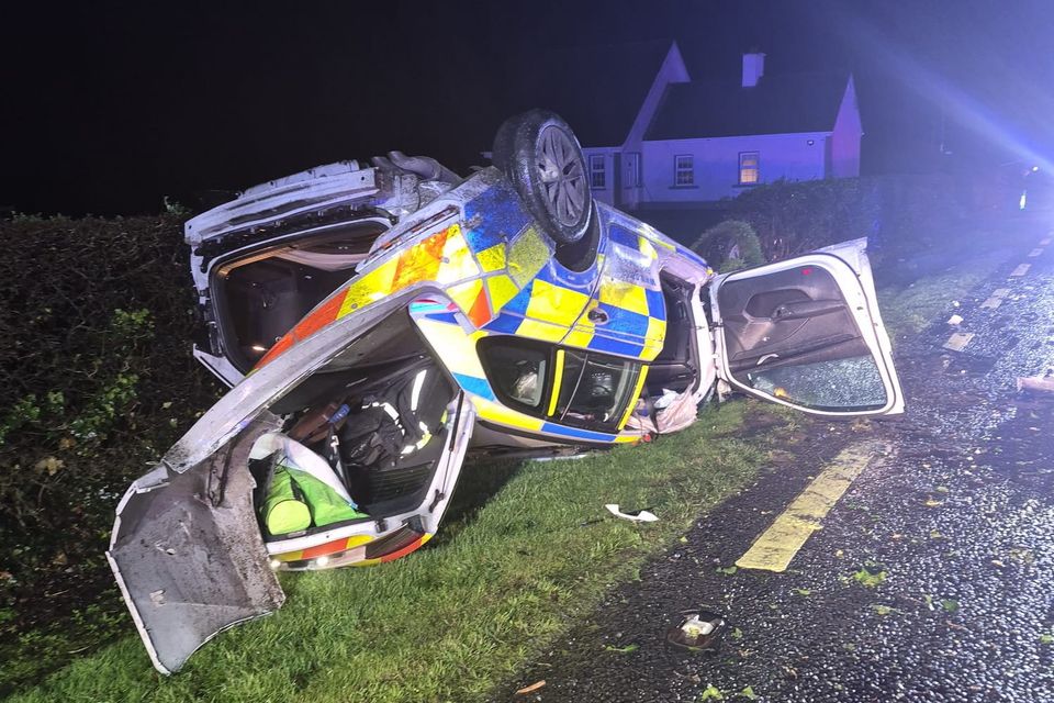 The garda patrol car ended up on its roof and beside a ditch following the crash.