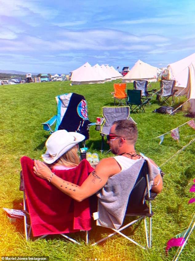 James and Mariel's first post together saw them with their arms around one another at the Beat-Herder Festival in Lancashire last July, (pictured)