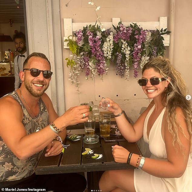 Another picture shows them saying 'cheers' to one another on a trip together