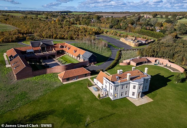 The Blyth Barn estate in Huntingfield, Suffolk, which has enraged locals who say their lives are being blighted by noise and 'half-naked party-goers roaming the streets