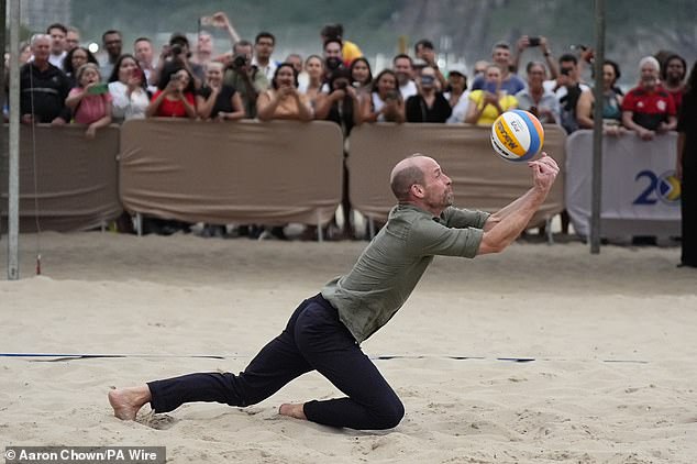 Tanned and sporting a trimmed beard, the father-of-three was also, notably looking to be in great shape as he whizzed around the sandy terrain to get the ball over the net - proving that being in his forties hasn't slowed him down one bit