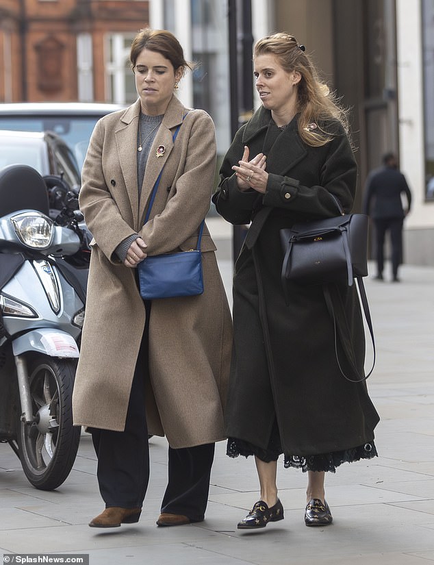 Eugenie and Beatrice in central London, in their first public appearance together since Andrew was stripped of all his royal titles