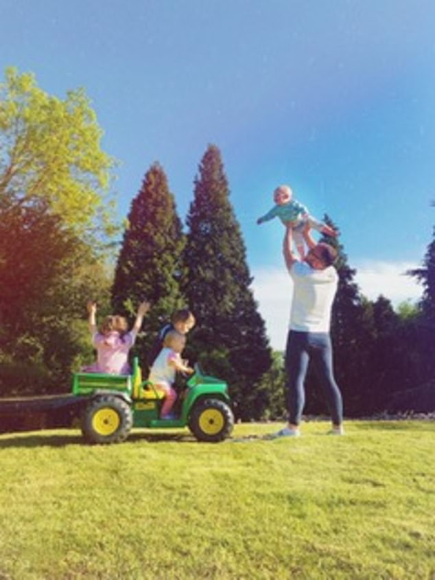 Jonathan with all four of his children before their social media break