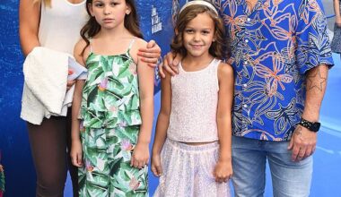 Anna Saccone and Jonathan Joly with Emilia (in green) and Edie at a premiere in 2022