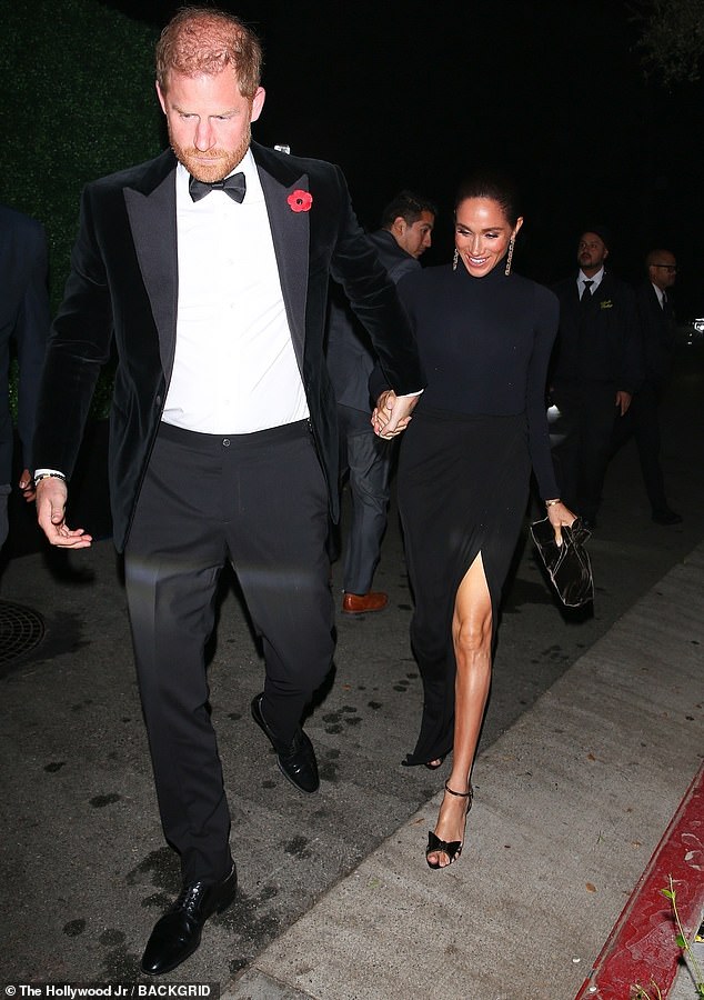 Prince Harry wore a poppy as he attended Kris Jenner's 70th birthday party. But Meghan noticeably did not wear the commemorative symbol