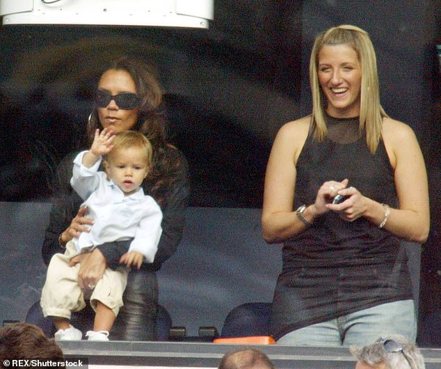 Joanne and Victoria, holding her son Romeo, watch David play for Real Madrid in Valladolid in 2003