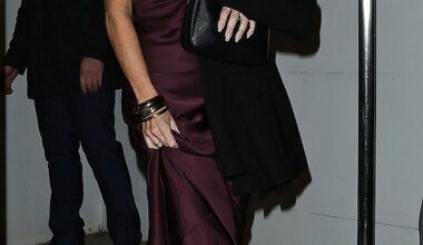 Joanne Beckham, 43, leaves Gordon Ramsay’s restaurant in Chelsea, west London, wearing a burgundy silk dress designed by her sister-in-law Victoria after her brother David was knighted