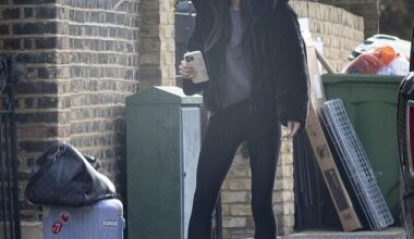 Holly Ramsay clutched a 'Bride' phone case as she broke cover on Thursday morning for the first time since her feud with fiancé Adam Peaty 's family came to light