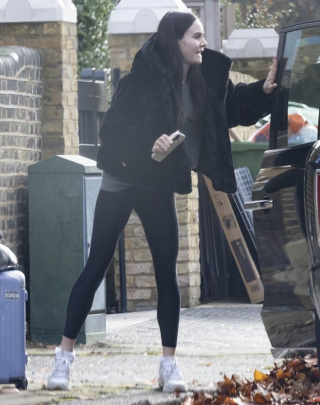 During her low-key outing, Holly kept things comfortable in black leggings and a padded jacket yet added some star power with her pricey luggage