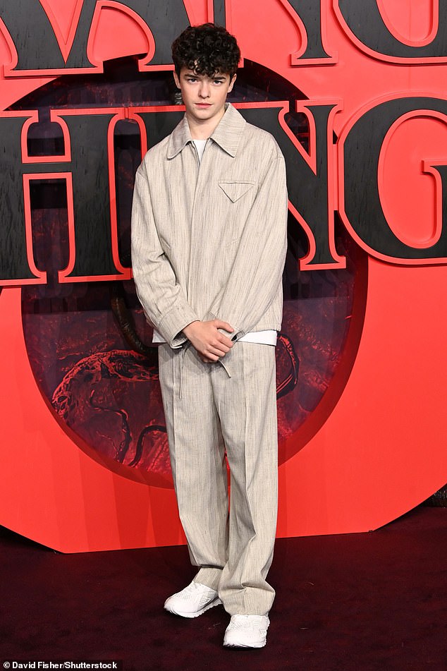 Owen Cooper opted for a beige jacket and matching trousers