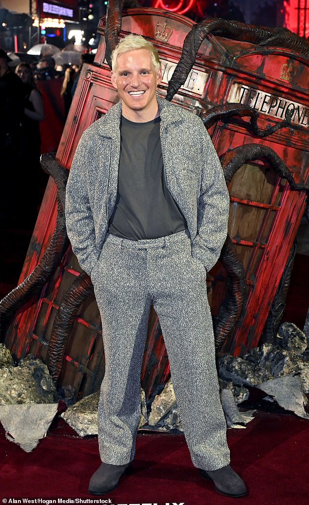 Jamie Laing flashed a smile as he walked the red carpet in a tweed set