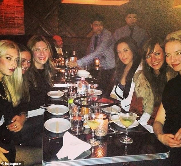 DeuxMoi was almost unmasked once before - by none other than Hailey Bieber, who discovered Lovallo's identity in 2020 after she and husband Justin Bieber, had been the subject of gossip posted online. (Lovallo is pictured third from right. Kempner is across the table)