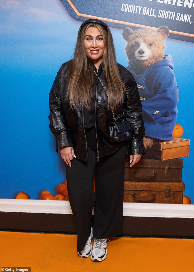 She opted for a relaxed look at the children's event as she slipped into a pair of white New Balance trainers