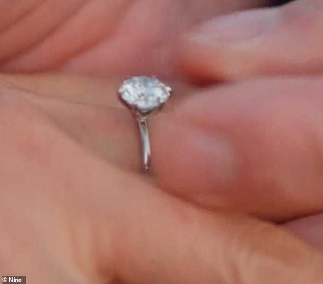 He also gave the lucky lady a massive diamond ring, which he slipped on her finger in front of a stunning mountain backdrop