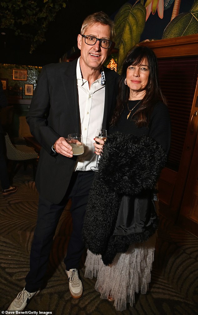 Joining him was his stylish wife, Nancy Strang, who looked elegant in a black jumper paired with a grey polka-dot layered tulle skirt