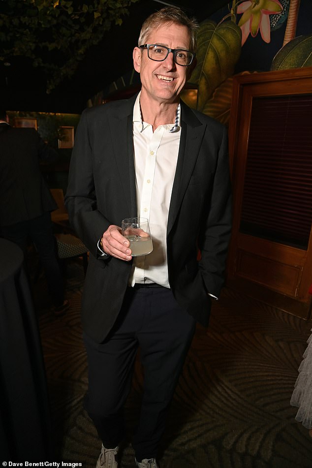Presenter Louis Theroux, 55, cut a smart figure in a black blazer and crisp white shirt as he attended the reception