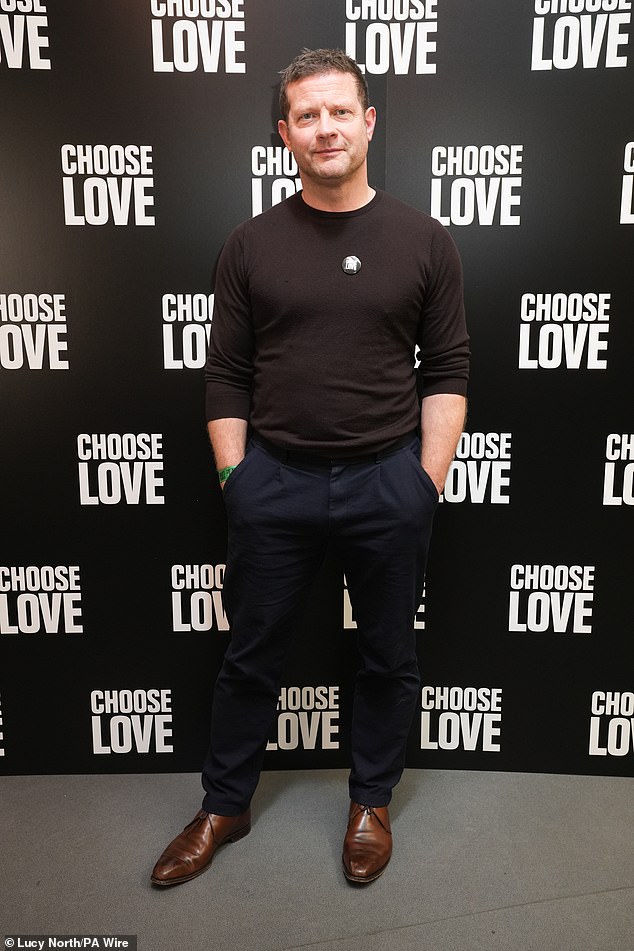 Dermot O'Leary cut a smart casual figure in a dark brown jumper and navy blue trousers as he arrived at the event