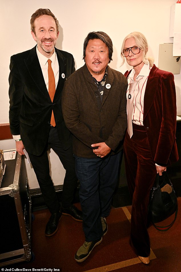 For the event, he cut a smart casual figure in a brown button over shirt paired with dark blue denim jeans (pictured with Chris O'Dowd and Joely Richardson backstage)
