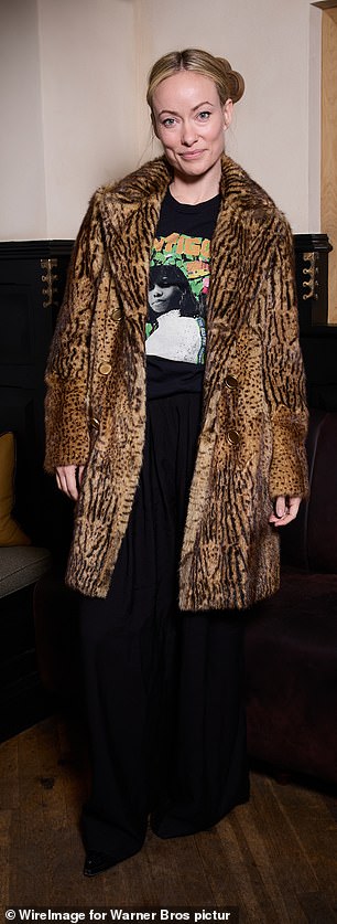 Olivia Wilde opted for a bold animal print coat